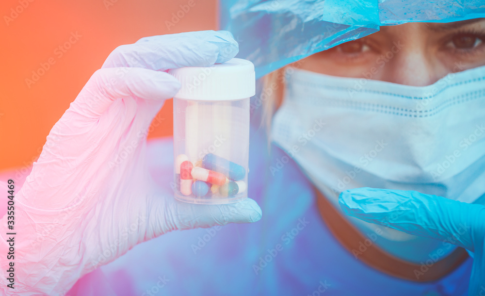 Fototapeta premium Female hand holding pills. Pills.