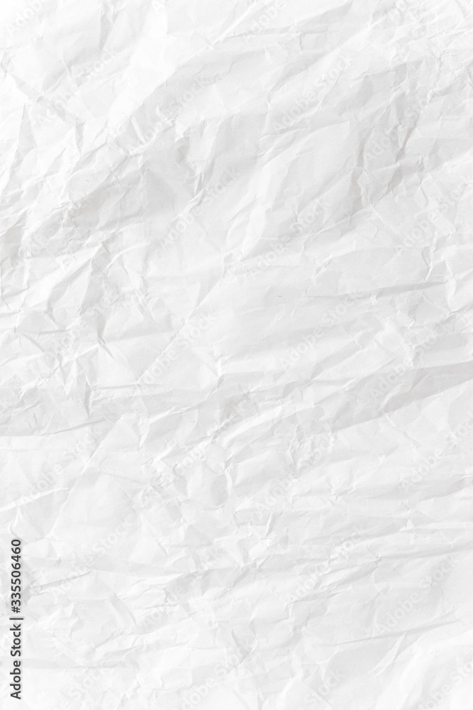  White crumpled paper close up texture background Vertical