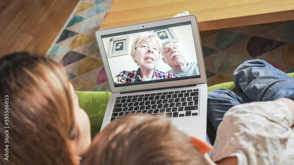 Young mom with son having a facetime video call with grandparents. Family  connecting with their parents on webcam. Modern technology connecting  people of all ages concept. Photos | Adobe Stock