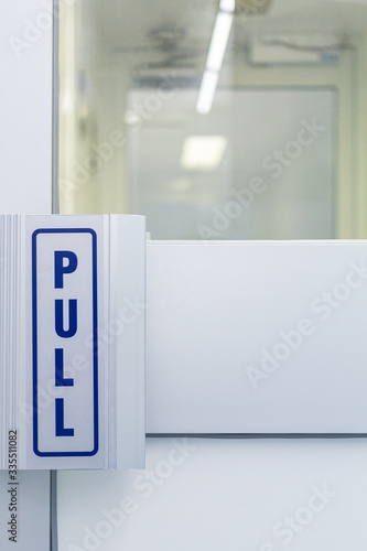 The steel door handle Inside white sterile cleanroom photo