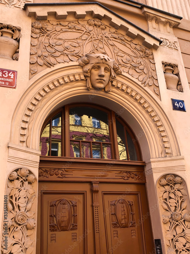 Obraz premium Pastel orange art nouveau building facade in Europe