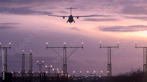 Manchester airport passenger jet landing in evening UK 4K photo