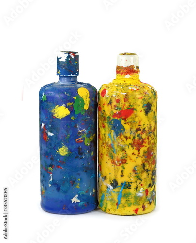 Plastic bottle dirty with paint colors. Closeup dirty plastic bottles contain water color 