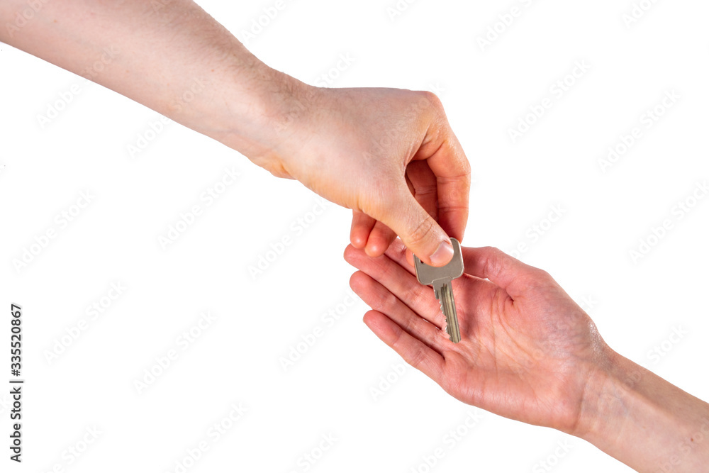 Person hands over keys to house isolated on white background Person hands over keys to house isolated on white background
