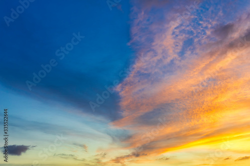 Sky with cloud and sun ray yellow and blue color background. With copy space for text or design. © AKGK Studio
