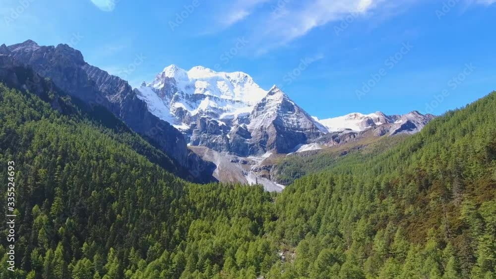 Aden yading mountains in China. Chinas sichuan province daocheng yading aden yangwaiyong Mountain (aerial photography) Aden yading mountains in China. Chinas sichuan province daocheng yading aden yangwaiyong Mountain (aerial photography)