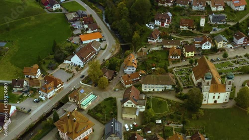 Aerial view of the village Schapbach in Germany on a cloudy day in autumn, fall.  photo