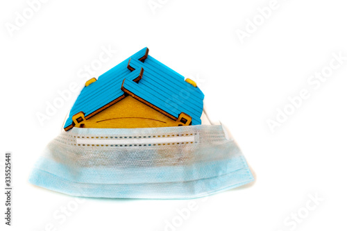 house with a ruble sign, on a white background, sitting at home, quarantine in Russia