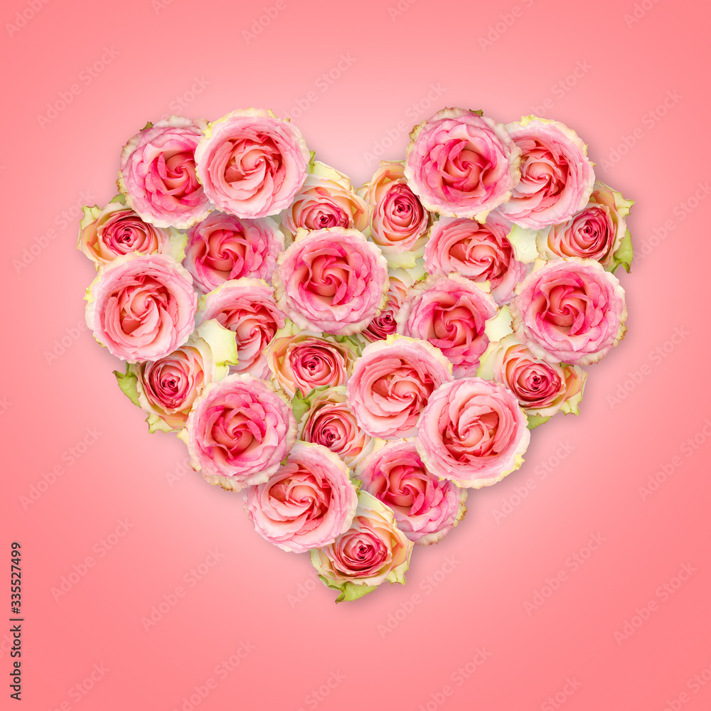 Bouquet of tea roses in the shape of a heart on a coral background. Valentine's Day. Bouquet of tea roses in the shape of a heart on a coral background. Valentine's Day.