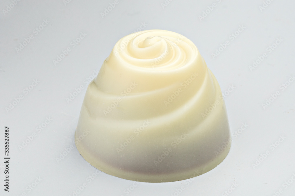 praline white chocolate isolated on the table praline white chocolate isolated on the table