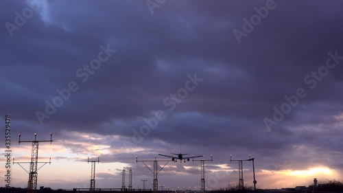 Manchester airport passenger jet landing in evening UK 4K photo