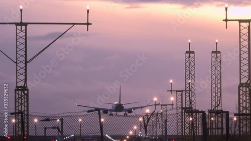 Manchester airport passenger jet landing in evening UK 4K photo