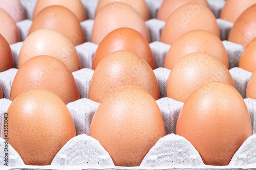 View of Organic farm eggs in an egg box is. Chickens eggs from ecologically clean areas