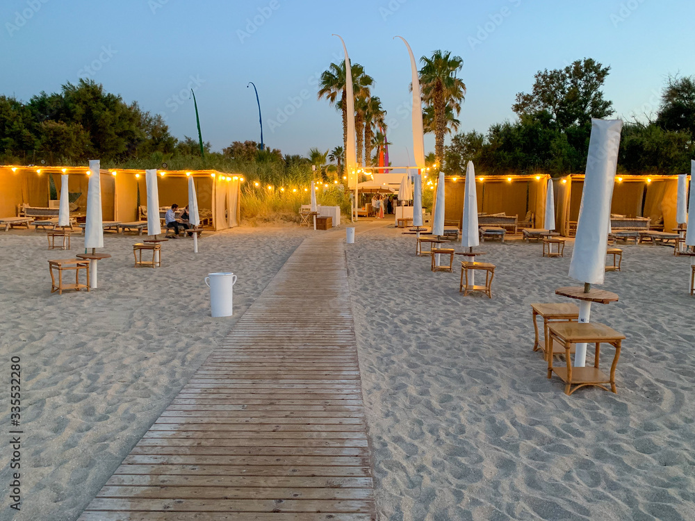 Beach bar Monopoli near Bari at sunset