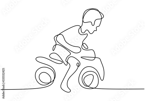 A boy playing with his moto...