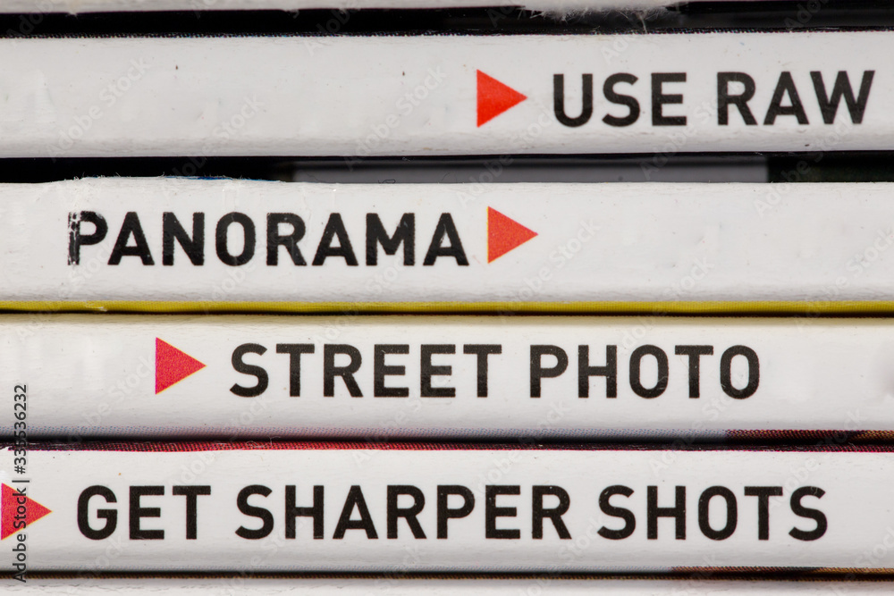 Use raw panorama street sharper Macro close up view of words in black text across horizontal lines abstract background Use raw panorama street sharper Macro close up view of words in black text across horizontal lines abstract background