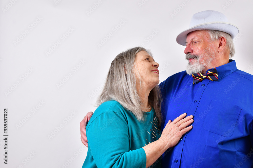 Loving couple hugging while in self isolation because of the covid-19 virus Loving couple hugging while in self isolation because of the covid-19 virus