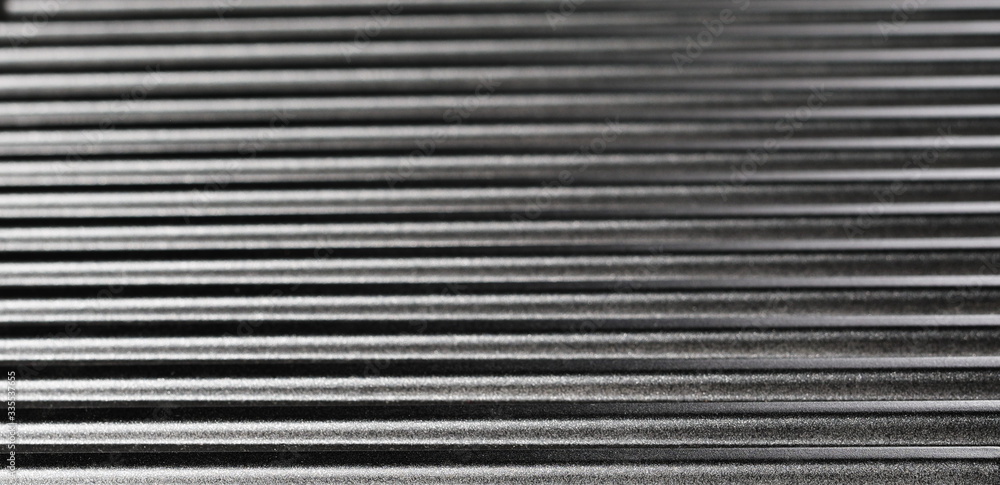 New grill metal surface, background and texture, side view