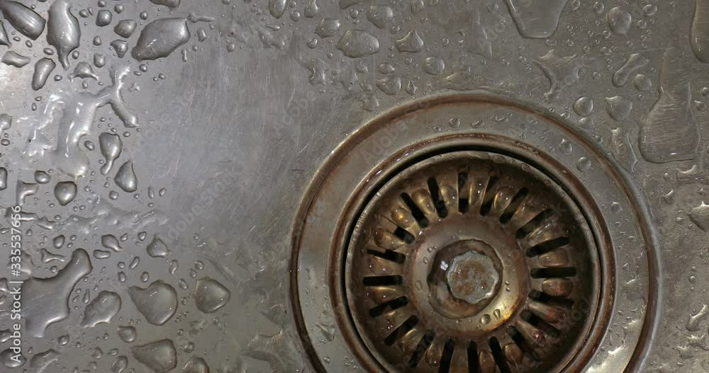 Dripping kitchen faucet over sink Dripping kitchen faucet over sink