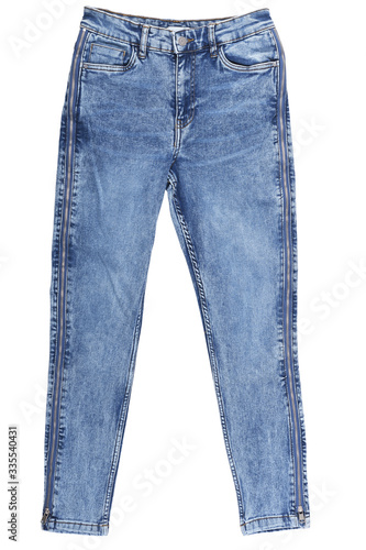 Blue jeans with zippers on the sides on a white background.Stack of various blue jeans on white background. Beauty and fashion, clothing concept. Detail of nice blue jeans. Jeans texture or denim back