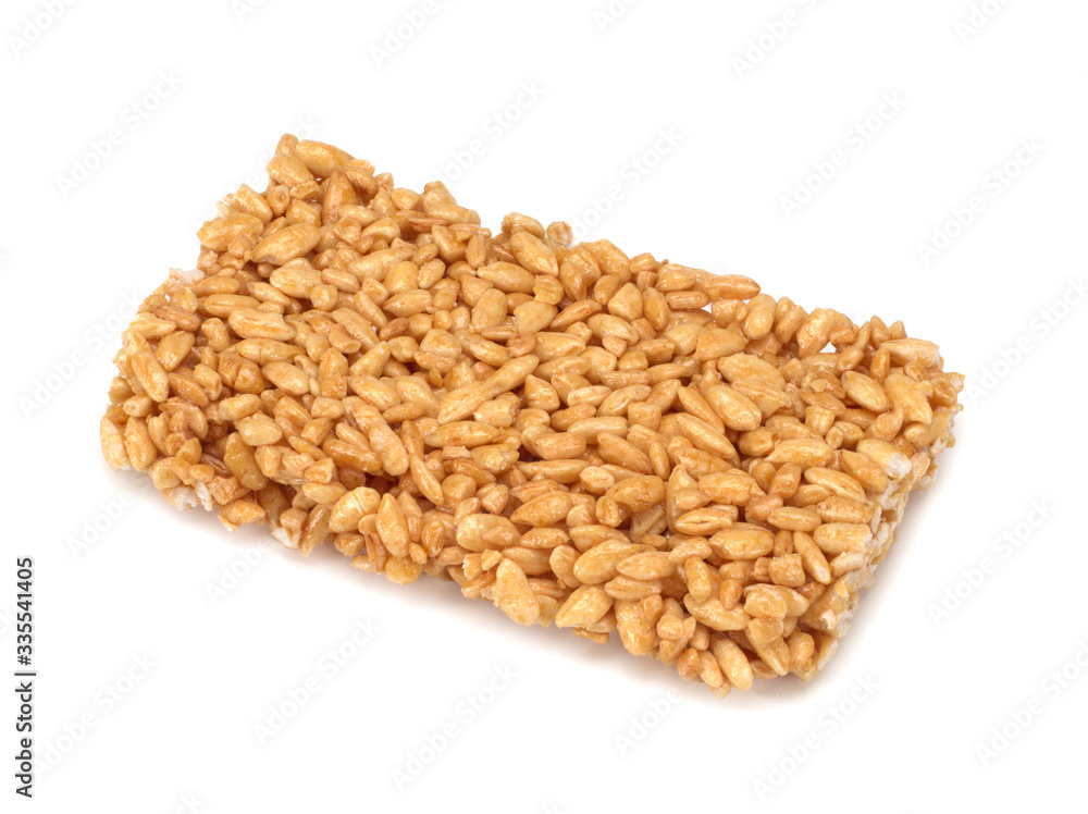 pressed sweet puffed rice on a white background pressed sweet puffed rice on a white background