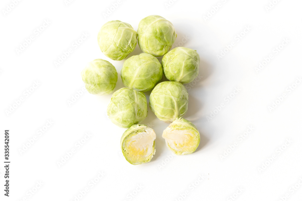 close up of brussels cabbage sprouts green vegetables very famous in Brussels, isolated on white background with copy space for text. close up of brussels cabbage sprouts green vegetables very famous in Brussels, isolated on white background with copy space for text.