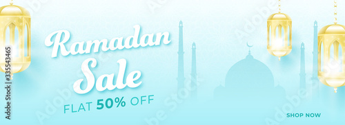 Islamic Holy Month of Ramadan Sale Banner with Illuminated Lanterns on Mosque Silhouette Background.