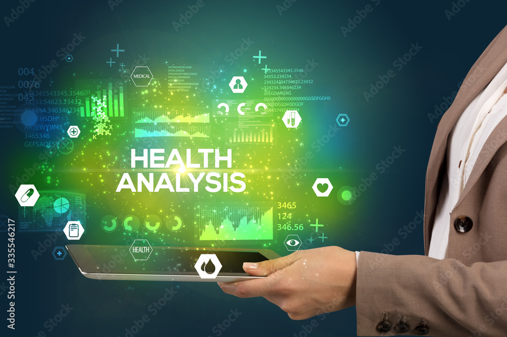 Close-up of a touchscreen with HEALTH ANALYSIS inscription, medical concept Close-up of a touchscreen with HEALTH ANALYSIS inscription, medical concept
