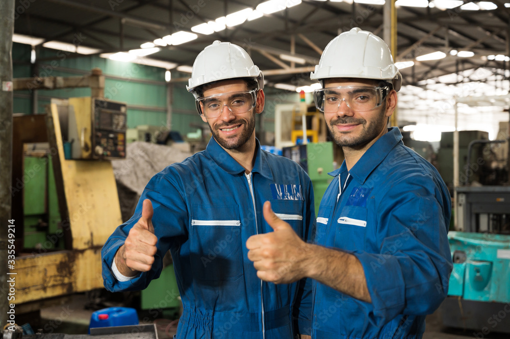 Industrial workers are working on projects in large industrial plants with many devices. Industrial workers are working on projects in large industrial plants with many devices.