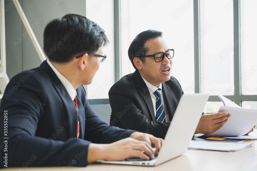 Asian business people team analyzing statistics financial. Team of businesspeople Meeting Conference Discussion Corporate Concept in office. Asian business people team analyzing statistics financial. Team of businesspeople Meeting Conference Discussion Corporate Concept in office.