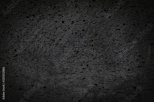 coarse black texture and background of basalt material