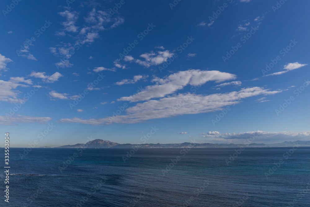 Obraz premium coastal landscape, calm blue sea, clear sky