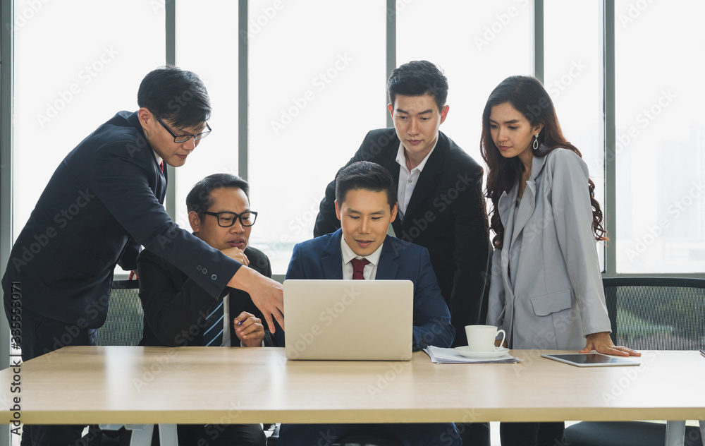 Asian business people team analyzing statistics financial. Team of businesspeople Meeting Conference Discussion Corporate Concept in office. Asian business people team analyzing statistics financial. Team of businesspeople Meeting Conference Discussion Corporate Concept in office.