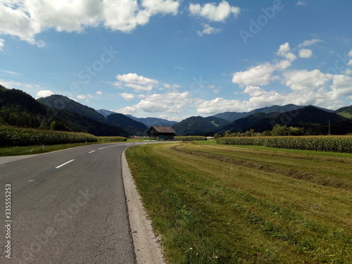 scenic road,mountain, landscape, mountains, travel, nature, asphalt, summer, forest, hill, europe,austria,clouds, alps, street, way, green, countryside, driving, scenery, tree, cloud