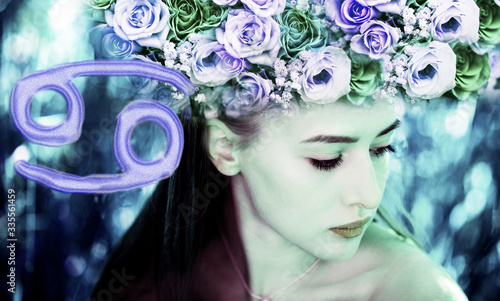 Astrological symbol of the zodiac Cancer and portrait of a girl
