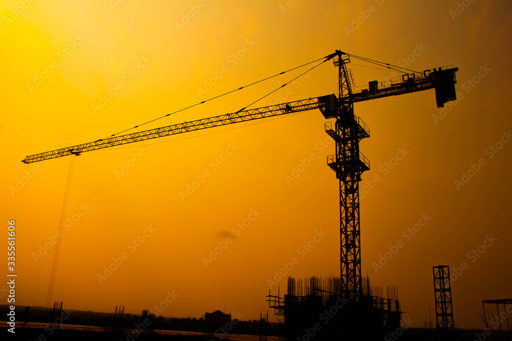  The construction crane on sunset
