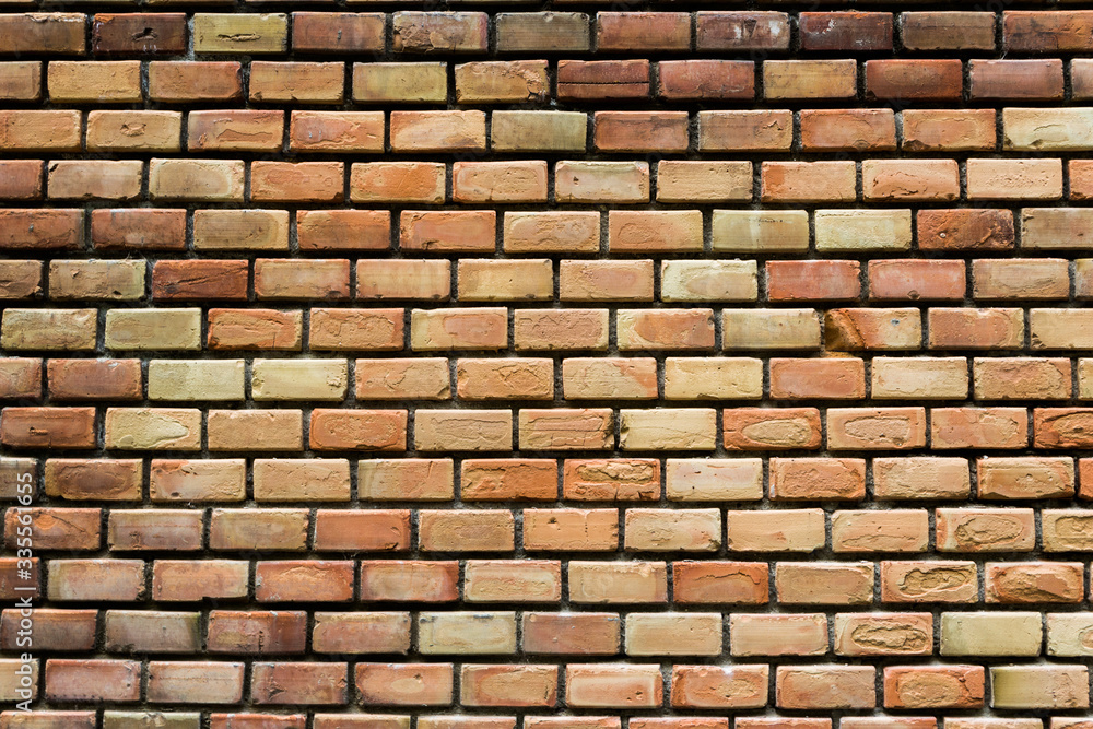 Obraz premium Old brick wall of a building, background, texture, pattern.