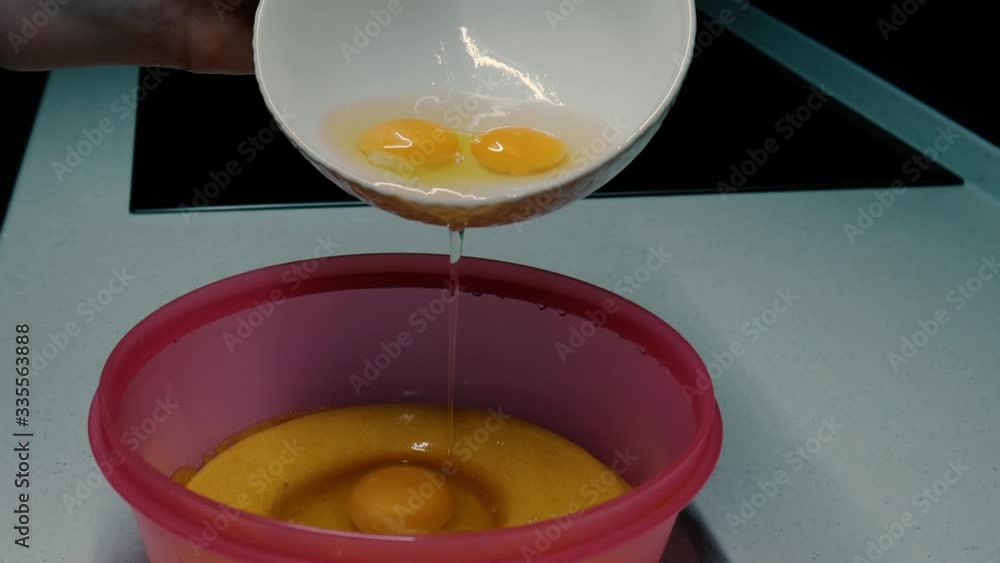 Eggs poured into a bowl Eggs poured into a bowl