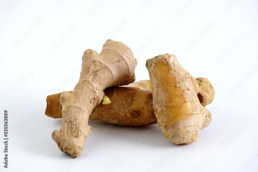 fresh ginger on a white background fresh ginger on a white background