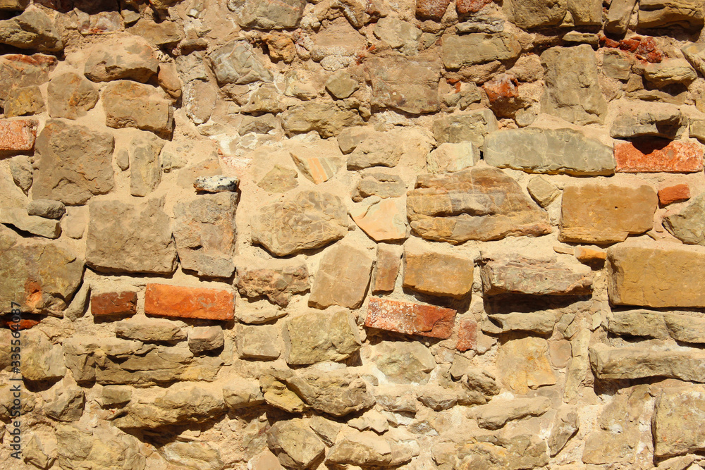 Medieval Rocks Color Old wall made of rocks. Medieval rocky surface. Texture of an old rocks ...