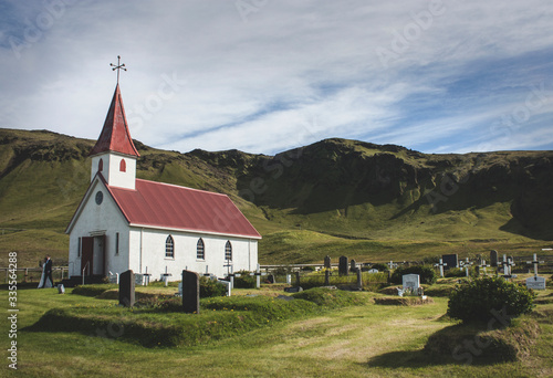 Couple just married going out of an isolated church in Iceland - Couple marié sortant d'une église isolée en Iceland