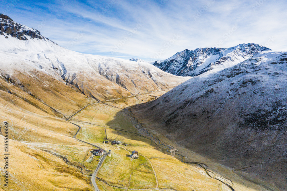 Huts in the autumnal landscape, aerial view, Braulio Valley, Stelvio