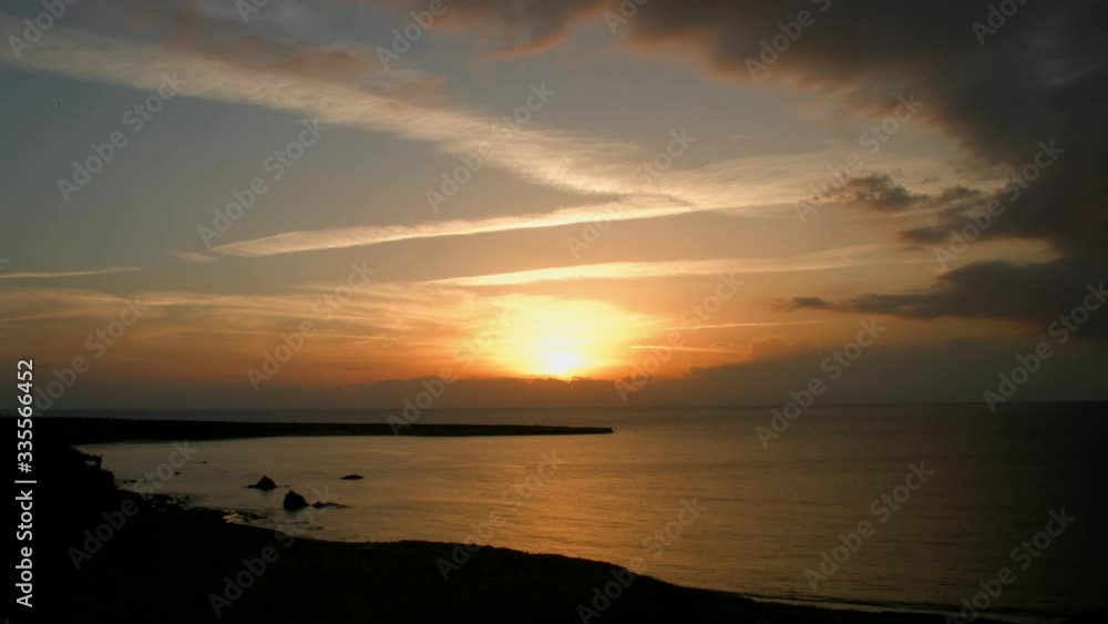 Timelapse of beautiful sunset. Sun going in to the sea Timelapse of beautiful sunset. Sun going in to the sea