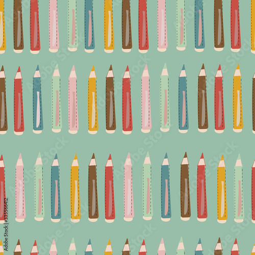 Vector blue seamless pattern with colorful pencils.