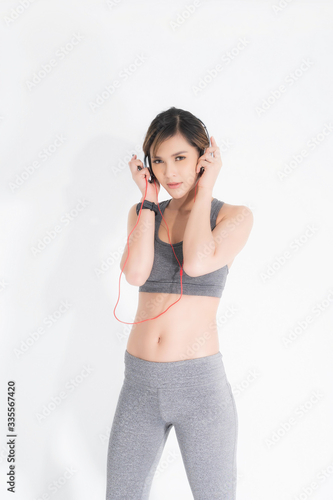 Growth portrait of fitness woman in sportswear. Growth portrait of fitness woman in sportswear.