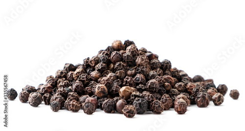 Pile of black pepper peas close-up on a white background. Isolated