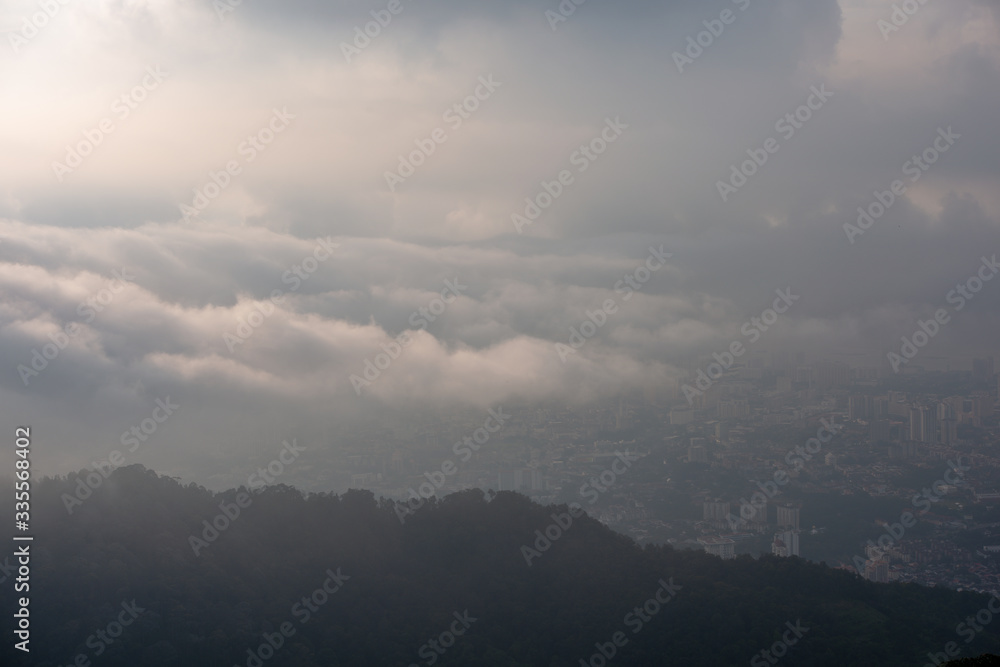 Sea Cloud cover Georgetown in hazy morning. View from Penang Hill. Sea Cloud cover Georgetown in hazy morning. View from Penang Hill.