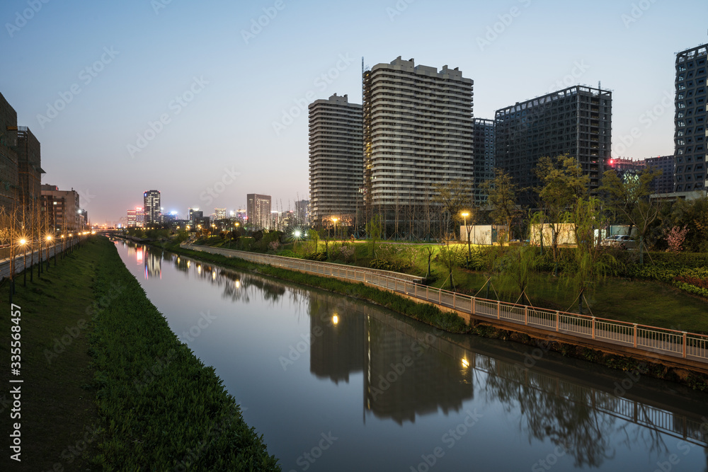 Fototapeta premium Modern business office buildings at sunset