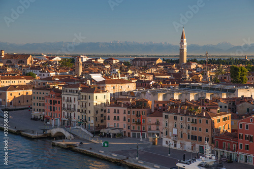 Venice, Italy - Houses on the Venice Canal and Alps in the morning light