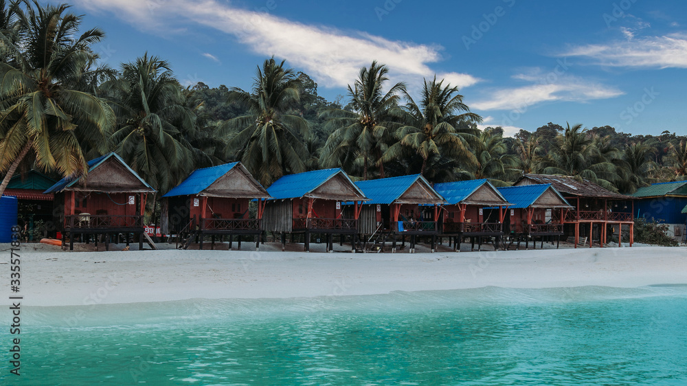 Koh Rong islang in Cambodia, Tropical palm trees and bungallows